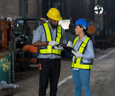 2 workers wearing safety helmets