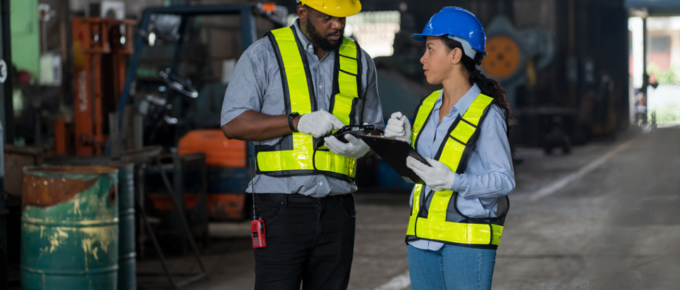 2 workers wearing safety helmets